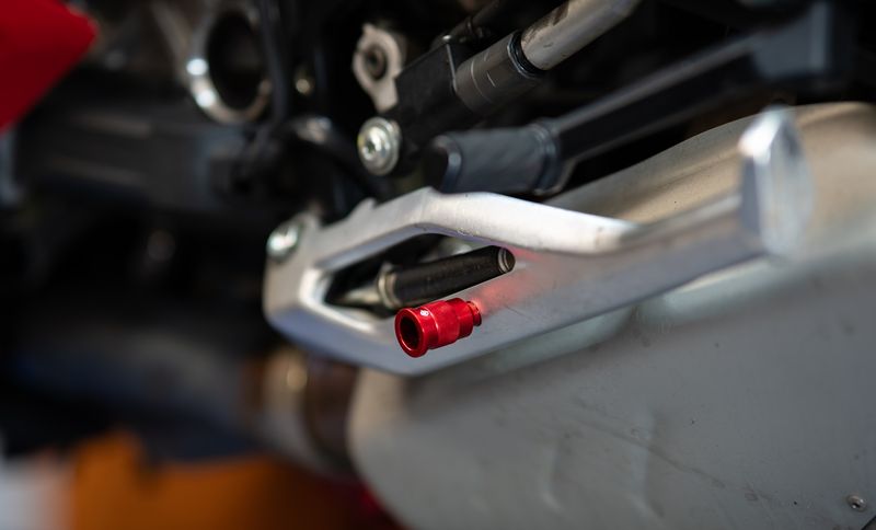 Ducati side stand pin red